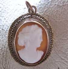 Greatly carved Victorian circa 1860-1890 Classic profile Unmarked/tested 18K Yellow Gold Brooch/Pendant