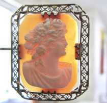 Well carved & designed shell Art Deco profile from 1925-1930. Signed. Tested by the jeweler as 10K White Gold Filigree Brooch/Pendant.