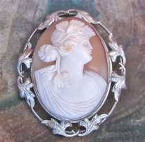 Quality Hand carved shell Bacchante from 1925-1930. Signed by Artist Marked/Tested 10K White Gold Filigree Brooch.