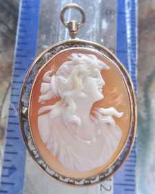 Female profile - Quality hand carved shell from 1925-1945. Set in 10K Yellow Gold Filigree Brooch/Pendant.