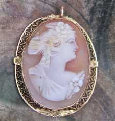 Quality Edwardian hand carved & signed shell from 1915-1935. Set in the tested 10K Yellow Gold Filigree Pendant.