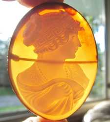 Museum Quality Art Deco carving shell portrait of young woman Unmarked 14K Yellow Gold Brooch circa 1915 - 1925.