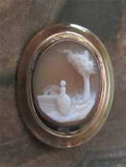Petite hand carved Antique Classic - Rebecca at the wail shell Unmarked/Tested 14K Yellow Gold brooch. Circa 1870