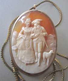 Scene of couple from XVIII century with a dog Museum Quality carving Victorian 14K Yellow Gold Pendant circa 1910. Signed by the Artist