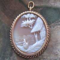 Hand carved and signed shell - landscape, woman at the village house Tested 10K (or more) Yellow Gold Victorian Pendant circa 1890