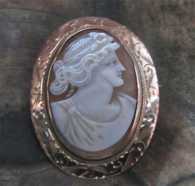 Classic Etruscan profile - Hand carved/signed shell circa 1910. Hallmarked/Tested 10K Yellow Gold etched Brooch.