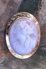 Greatly Carved & Signed Coral Stone Victorian time Marked 10K Yellow Gold Classic Brooch circa 1905.