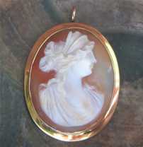 Classic Roman Goddess Ceres profile- Hand carved & signed shell. Set in tested 10K(+) Yellow Gold Brooch/Pendant 1895 - 1915.