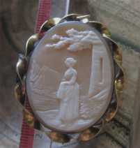 Victorian landscape scene - woman at the house - greatly carved shell Tested 18K+ Yellow Gold twisted rope frame pendant, circa 1870