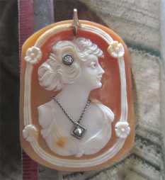 Superiorly hand carved Art Deco shell with 2 diamonds inside Circa 1920th unmarked 14K Yellow/White Gold Pendant.