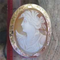 Hand carved shell Ceres Motherhood/Fertility Goddess, circa 1910. Victorian/Edwardian hallmarked 10K Yellow Gold Brooch.