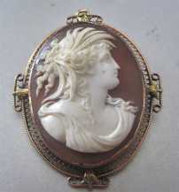 Ceres Goddess circa 1875 Museum carved dark Sardonyx shell Marked 10K/tested higher Yellow Gold Brooch/Pendant.