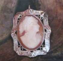 Greatly hand carved/signed shell - late Art Nouveau girl from 1920th Hallmarked Filigree Decorative White 10K Gold Brooch/Pendant.