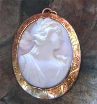 Carving high relief Coral stone depict Ceres Goddess circa 1905 Marked 10K Yellow Gold Late Victorian Brooch/Pendant.
