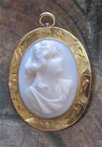 Carved & Signed Coral Victorian Stone Goddess 10K Yellow Gold Brooch/Pendant circa 1905.