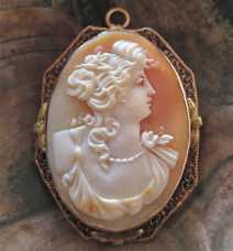 Curly Edwardian Beauty - the hand carved shell from 1910th Marked/tested 10K Yellow Gold filigree pendant/brooch.