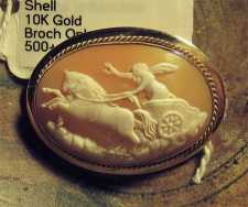 Greatly Hand Carved shell - Aeolus on the way to Bocchus. 1910th-1940th Hallmarked 10K Yellow Gold brooch.