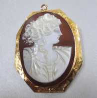 Goddess of Moon Diana- Hand carved and signed Dark Sardonyx Shell. Hallmarked 10K Yellow Gold Brooch/Pendant circa 1910th - 1920th.