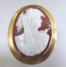 Post Edwardian Ceres Goddess carved and signed sardonyx shell. Tested 10K+ Yellow Gold Brooch. Great Antique circa 1910-1920