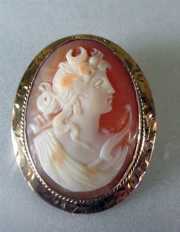 Carnelian carved Shell Cameo with Diana Goddess image Marked 10K Yellow Gold Brooch. Circa 1910