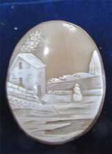 Carved/signed shell - woman at the village bank, circa 1870 Unmarked/Tested 10K Yellow Gold brooch (broken pin).