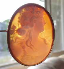 Circa 1870th carved Sardonyx shell - Bacchante priestess. Tested 18K Yellow Gold Museum Quality Antique Brooch.