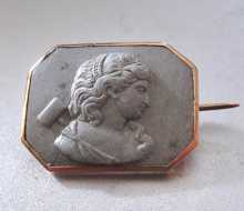 1860th Quality carved Lava stone Thor Goddess of Thunder Unmarked/tested 9 carats Yellow Gold brooch