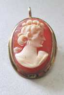 Hand carved Carnelian shell circa 1940th - 1950th. Marked/tested 10K Yellow Gold Pendant/Brooch.
