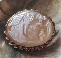 Carved/Signed shell - circa 1890th village scene. Tested by jeweler 9K Yellow Rose brooch.