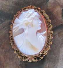Circa 1920th carved/signed shell - Ceres Goddess of fertility. Hallmarked 10K Yellow Gold filigree Brooch/Pendant.