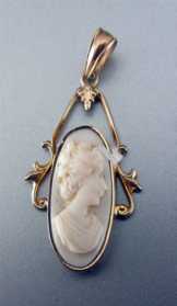 Marked 10K Yellow Gold carved Coral Cameo Pendant Circa 1910