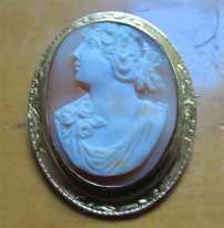 Well hand carved/profile of Victorian/Edwardian flower Beauty. Hallmarked 10K Yellow Gold 1890-1910 inside frame Brooch.