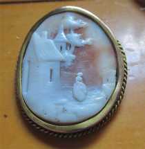 Greatly carved Victorian Pastoral Scene- Sardonyx Shell circa 1880. Unmarked/tested 14K Yellow Gold Brooch around.