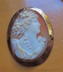 Big hand carved/signed shell profile of Post Edwardian Beauty. Set in 10K Yellow Gold Brooch/Pendant 1920-1930.