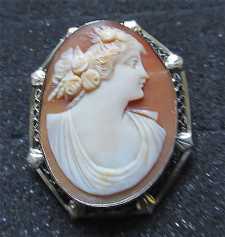 Quality Carved Art Deco shell from 1920th Beauty. Set in 14K White Gold filigree Brooch/Pendant.