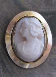 Antique carved Victorian/Edwardian carved Angel Skin lady’s portrait Marked 10K & CRR Yellow Gold Cameo Brooch