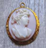 Quality carved and signed Coral Stone - Bacchante Priestess circa 1910 Victorian/Edwardian 10K Yellow Gold Etched Brooch/Pendant.