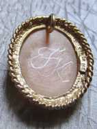 Hand carved/signed Beauty circa 1930th - 1940th. Hallmarked/tested 10K+ Yellow Gold Pendant.
