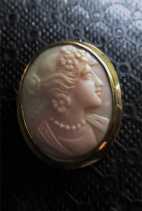 Hand carved Post Edwardian Coral/Angel Skin stone. Hallmarked 14K Yellow Gold Brooch circa 1920.