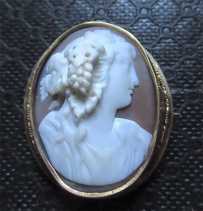 Hand carved Sardonyx high relief shell Bacchante priestess. Tested 14K+ Yellow Gold Brooch circa 1870 - 1895.