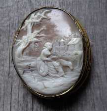 Victorian pastoral scene of girl and sheep at the village landscape Unmarked/tested Museum 9K Yellow Gold brooch circa 1875