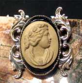 Victorian lava beautifully carved & embedded on black Agate stone 9K Yellow Gold Brooch Classic from 1870th.