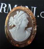 Sardonyx Shell cameo Marked on the clasp 10K Yellow Gold etched bezel Cameo Brooch. Circa 1915