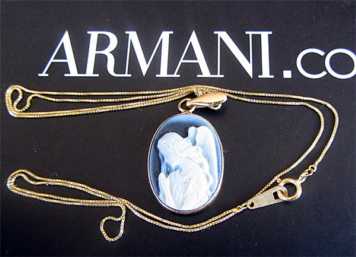 Italian Dark Blue Agate set in Marked 14K Yellow Gold Bezel & 14K Yellow Gold Chain. Slogan on the back of cameo