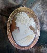 Circa 1895 Superior Quality high relief Light Carnelian Shell Cameo Etched Brooch/Pendant marked 10K Rose Gold.
