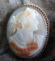 Circa 1895 Quality transparent Shell Roman woman portrait Tested 10K Yellow Gold bezel. Some damage