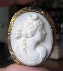 Quality Angel Skin Coral Image of Roman Goddess of Hunting Diana Unmarked 9K Yellow Gold (or higher) Pin/Pendant. Circa 1915
