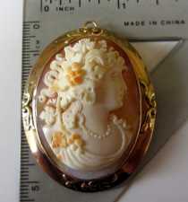 Museum Quality Bacchante Carnelian Shell High Relief carving Classic Marked (10K) Yellow Gold Brooch/Pendant circa 1915