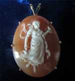 Walking Woman image hand carved Carnelian shell Marked 14K Yellow Gold bezel Cameo Pendant.