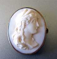 Amazing Quality Coral stone carving Apollo embedded in 14K Gold Circa 1890, vanished hallmark on the clasp (broken pin)